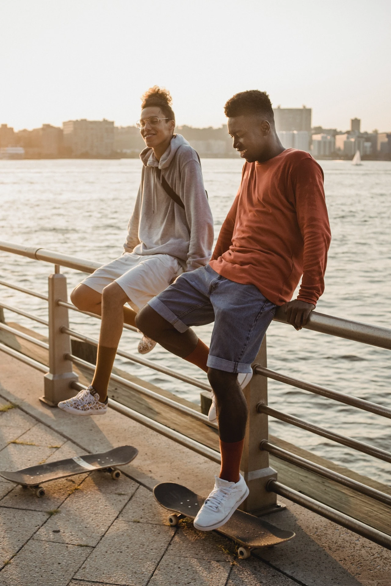 Men-Sitting-on-a-Handrail-talking-to-friend-about-mental-health